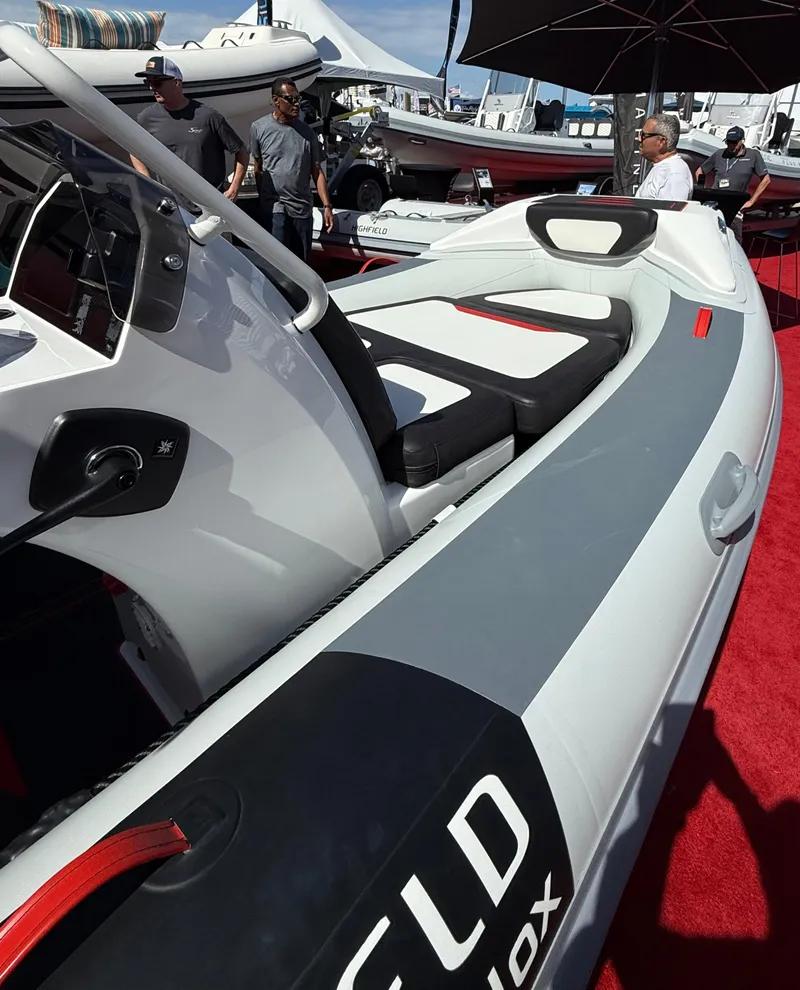 Slide: The Image of 2025 Highfield Velox 420 boat displayed at a marine exhibition. - 5