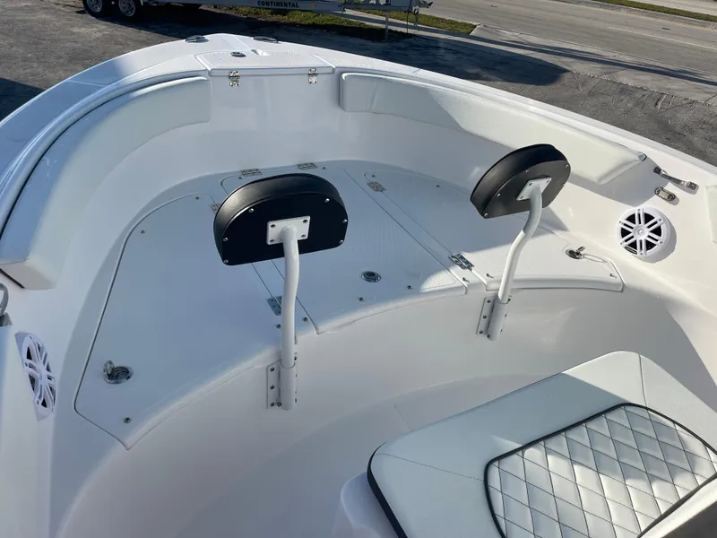 Slide: The Image of 2025 Clearwater 2200 WI Center Console boat interior with seating and storage. - 8