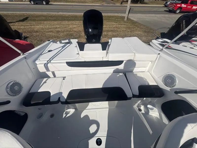 Slide: The Image of 2025 Tahoe 185 S boat interior with white seating and modern design. - 1