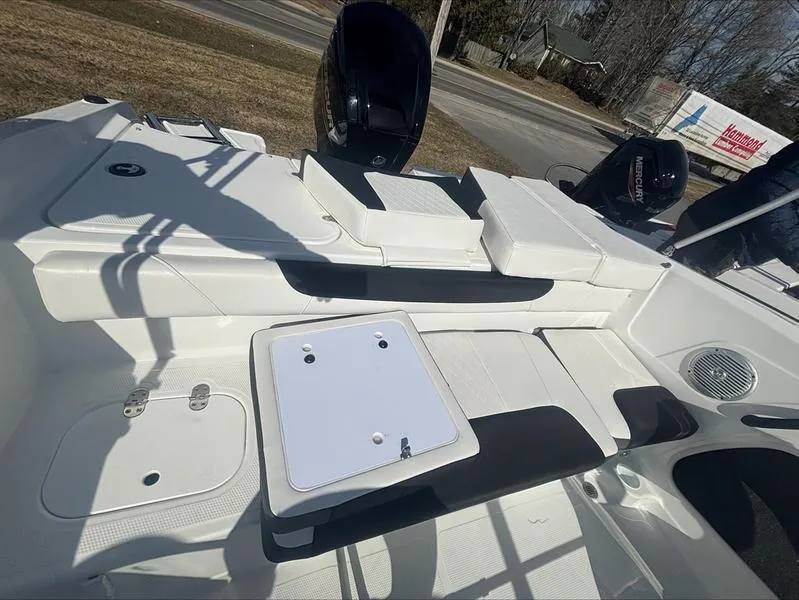 Slide: The Image of 2025 Tahoe 185 S boat interior with seating and storage compartments. - 4