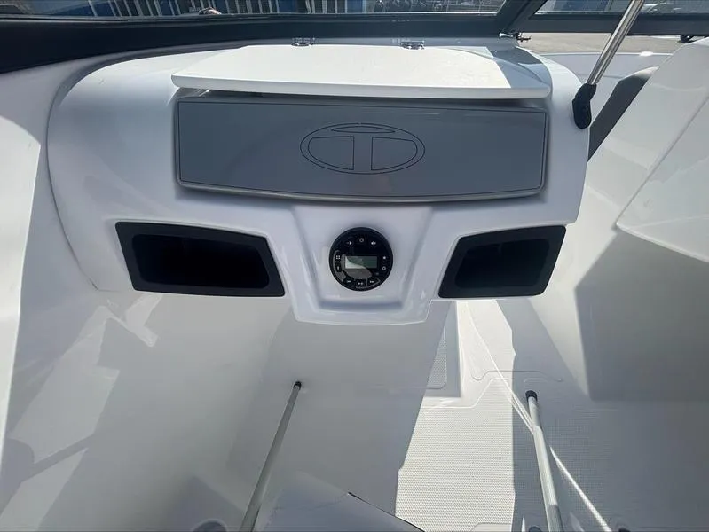 Slide: The Image of 2025 Tahoe 185 S boat dashboard with modern design and control panel. - 6