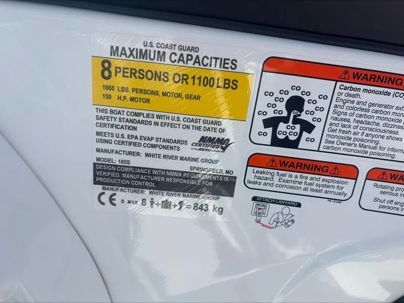 Slide: The Image of 2025 Tahoe 185 S boat capacity label, 8 persons or 1100 lbs, safety warnings included. - 7