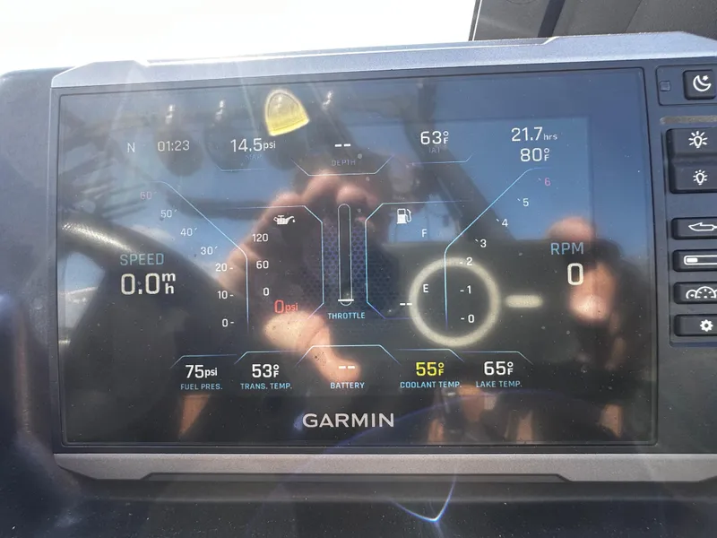 Slide: The Image of Garmin display on 2022 Axis A24 boat showing speed, RPM, and temperature metrics. - 20