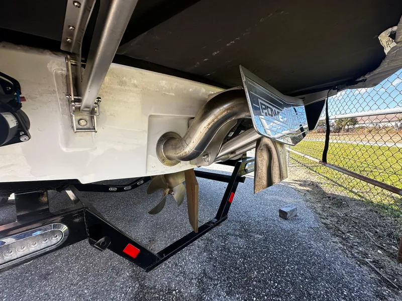 Slide: The Image of 2022 Axis A24 boat underside showing propeller and exhaust system. - 6