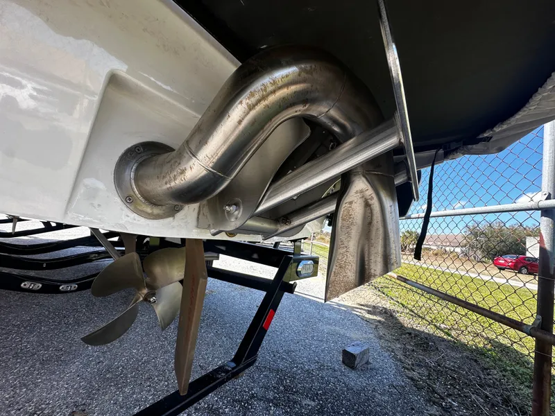 Slide: The Image of 2022 Axis A24 boat propeller and exhaust system close-up. - 7
