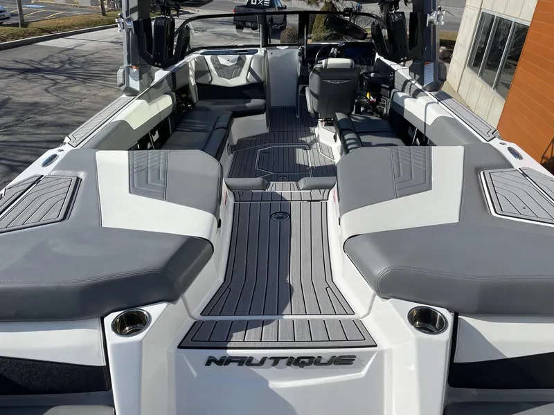 Slide: The Image of 2022 Nautique Super Air Nautique G25 interior with sleek seating and modern design. - 4