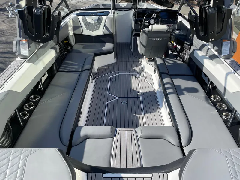 Slide: The Image of 2022 Nautique Super Air Nautique G25 interior with sleek seating and modern design. - 5