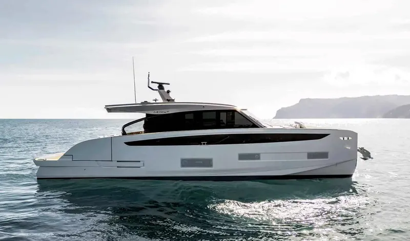 The Image of 2025 Azimut Seadeck 6 yacht on calm sea, sleek design, side view. - 0