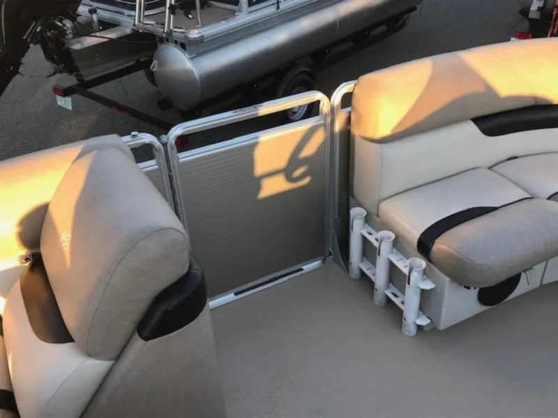 Slide: The Image of Cypress Cay Seabreeze 180 pontoon boat interior, beige seating, 2013 model. - 15