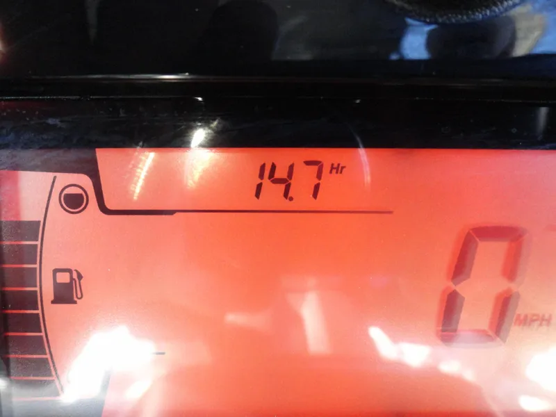 Slide: The Image of Dashboard display of 2024 Sea-Doo Switch Sport 18, showing 14.7 hours and 0 MPH. - 10