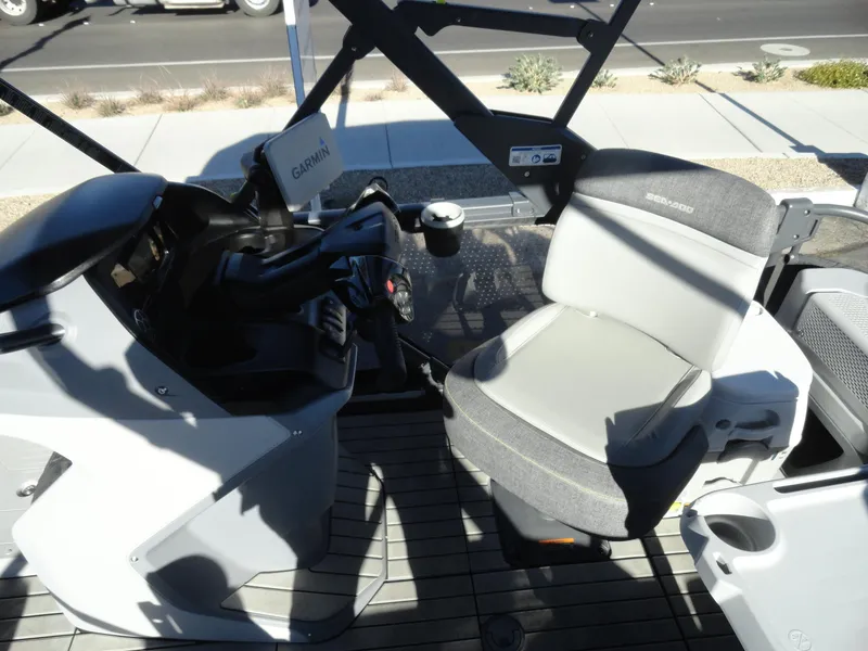 Slide: The Image of 2024 Sea-Doo Switch Sport 18 interior with steering console and seating. - 13
