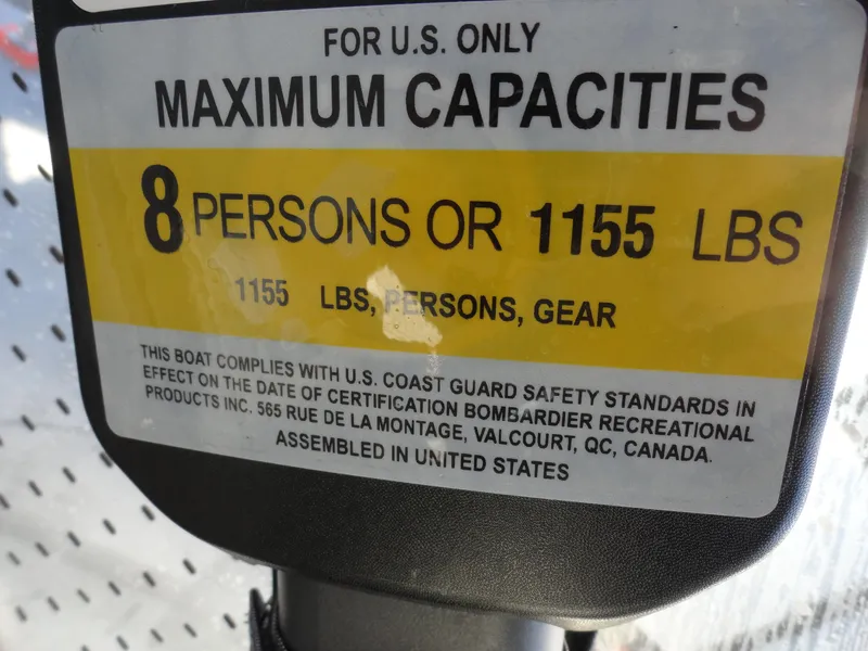 Slide: The Image of 2024 Sea-Doo Switch Sport 18 capacity label: 8 persons or 1155 lbs, U.S. Coast Guard compliant. - 15