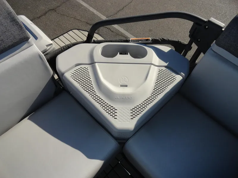 Slide: The Image of 2024 Sea-Doo Switch Sport 18 interior seating with storage compartment. - 21