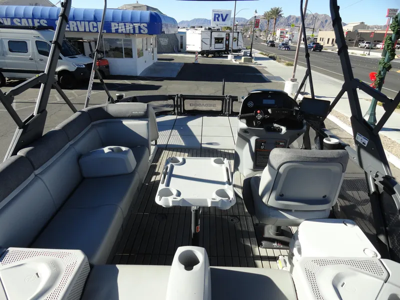 Slide: The Image of 2024 Sea-Doo Switch Sport 18 interior with seating and control panel. - 6