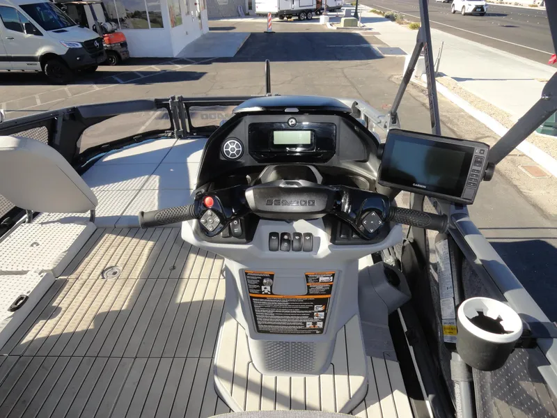Slide: The Image of 2024 Sea-Doo Switch Sport 18 dashboard with controls and navigation display. - 9