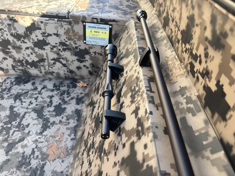 Slide: The Image of 2025 Edge Duck Boats 756DB with camouflage interior and mounted rod holder. - 17
