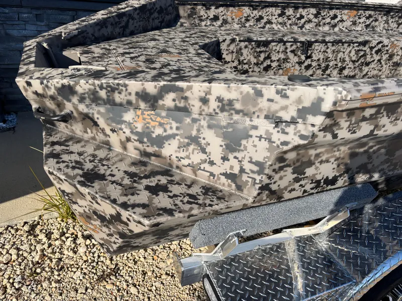 Slide: The Image of 2025 Edge Duck Boats 756DB with camouflage design on a trailer. - 24