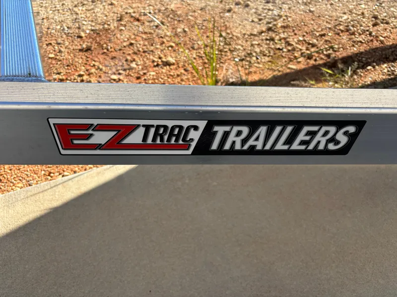 Slide: The Image of EZ Trac Trailers logo on Edge Duck Boats 756DB, 2025 model. - 33