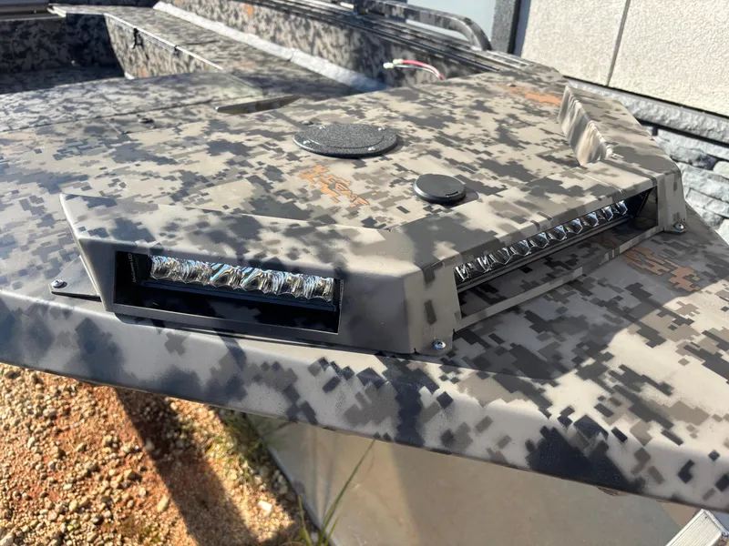 Slide: The Image of 2025 Edge Duck Boats 756DB with camo pattern and LED lights. - 11