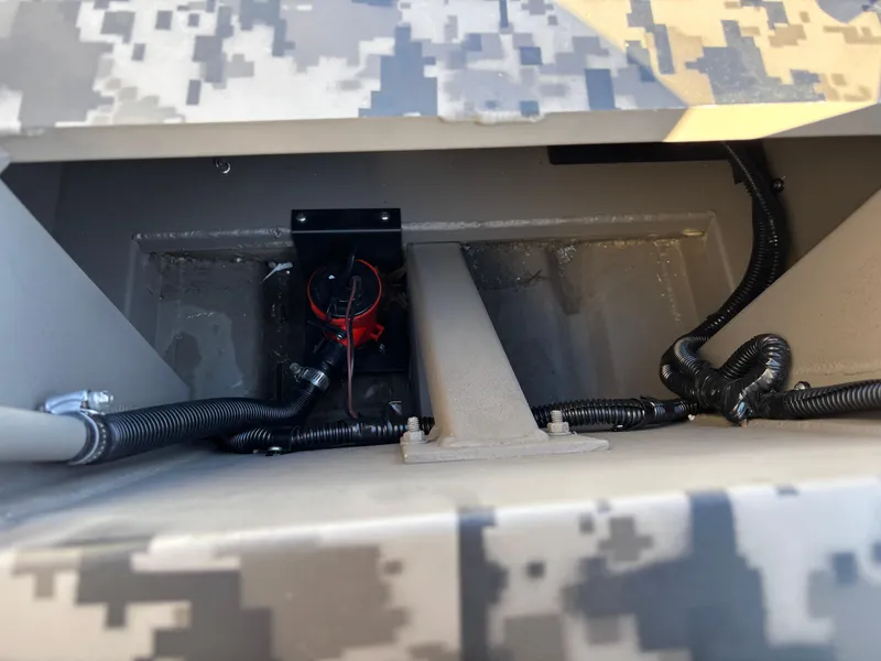 Slide: The Image of 2025 Edge Duck Boats 756DB interior wiring and battery compartment. - 21