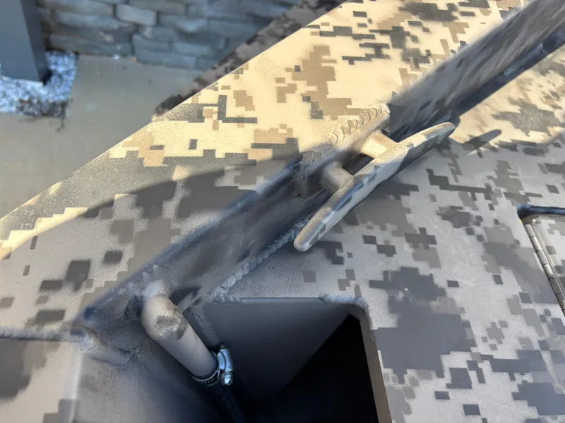 Slide: The Image of 2025 Edge Duck Boats 756DB with camouflage pattern and cleat detail. - 23