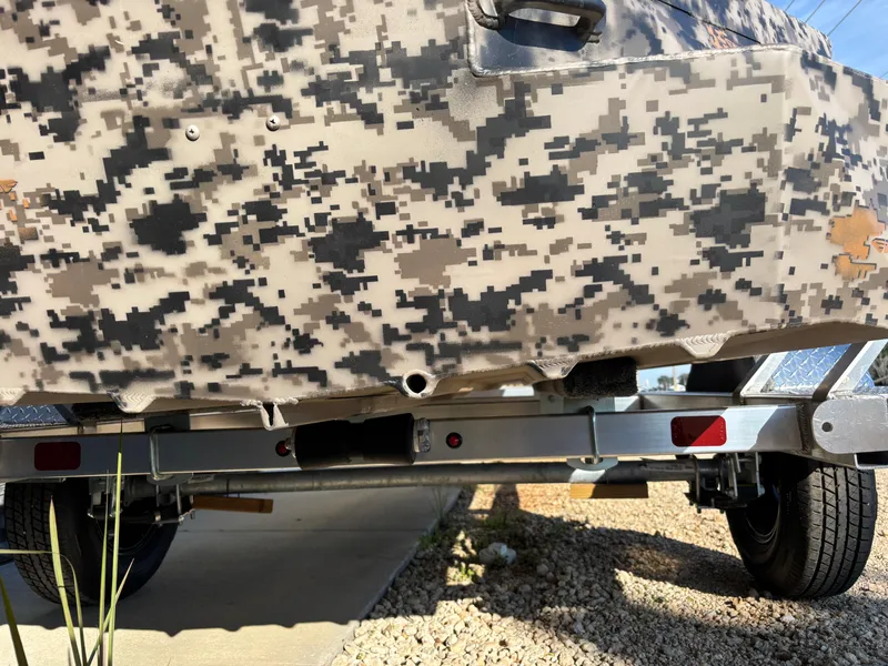 Slide: The Image of 2025 Edge Duck Boats 756DB with camouflage pattern on a trailer. - 27