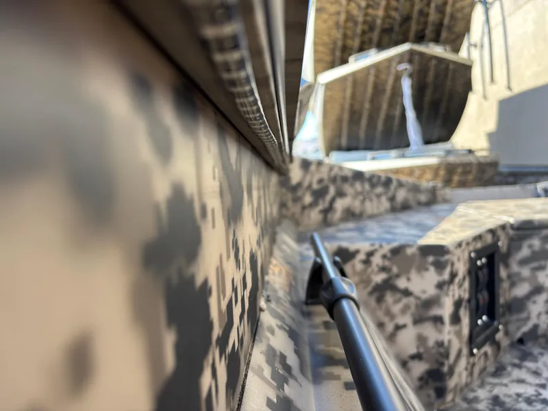 Slide: The Image of 2025 Edge Duck Boats 756DB with camouflage design, close-up interior view. - 29
