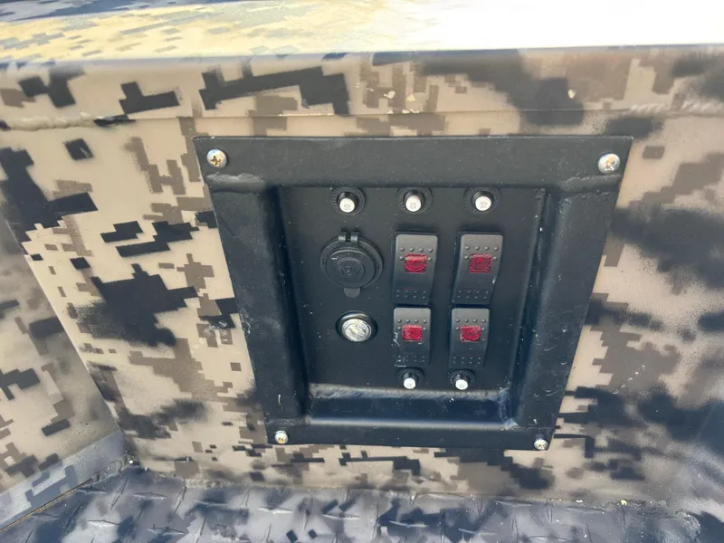 Slide: The Image of Control panel on 2025 Edge Duck Boats 756DB with camouflage design. - 6