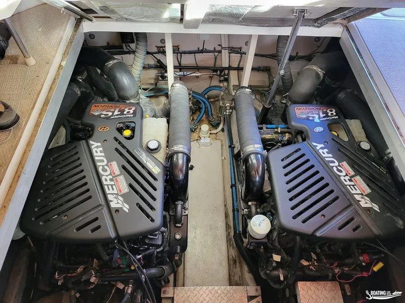 Slide: The Image of Engine compartment of 2003 Sea Ray 380 Sundancer with twin Mercury 8.1S Horizon engines. - 21