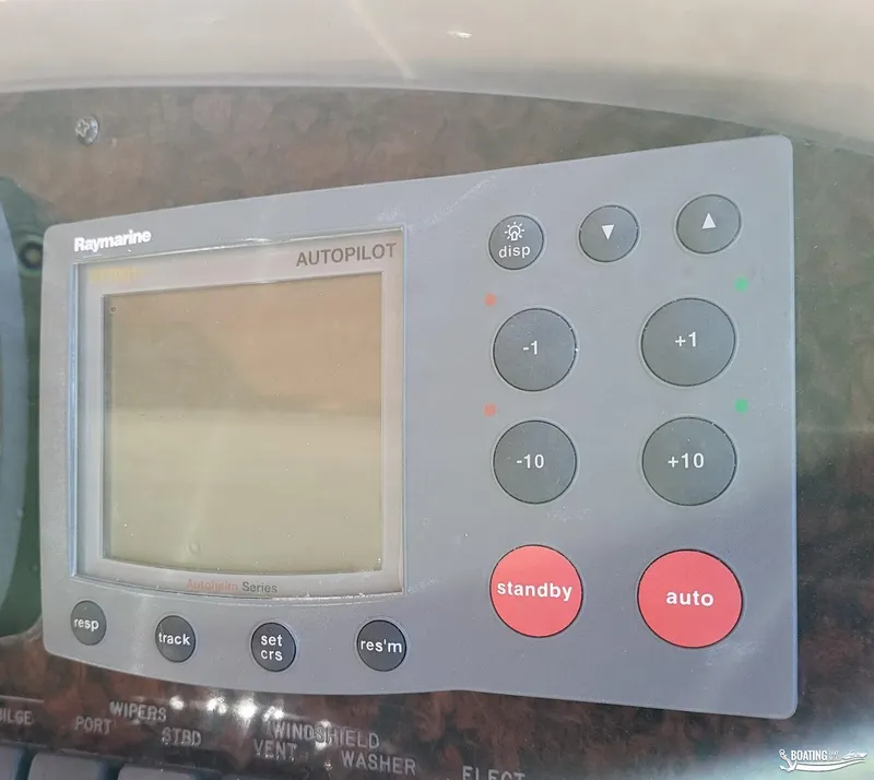 Slide: The Image of Raymarine autopilot control panel on 2003 Sea Ray 380 Sundancer boat. - 23