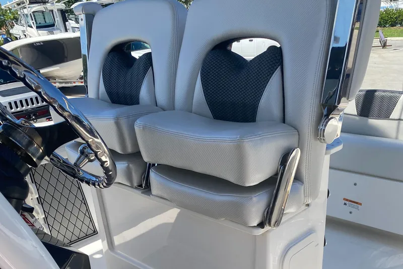 Slide: The Image of 2019 Wellcraft 242 Fisherman boat seats with sleek design and comfortable cushioning. - 29