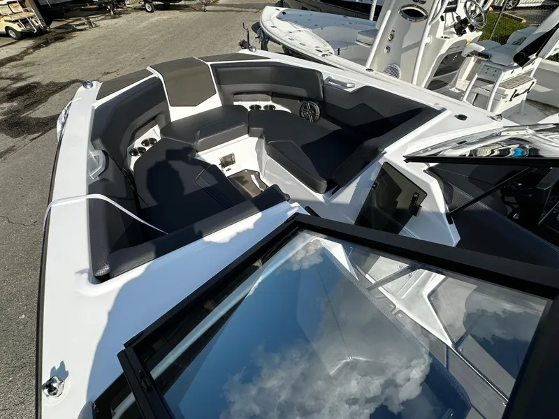 Slide: The Image of 2024 Scarab 235 Wake ID boat interior with sleek seating and modern design. - 11
