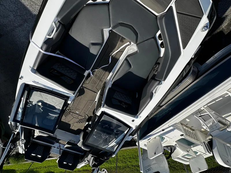 Slide: The Image of 2024 Scarab 235 Wake ID boat interior with sleek seating and modern design. - 12
