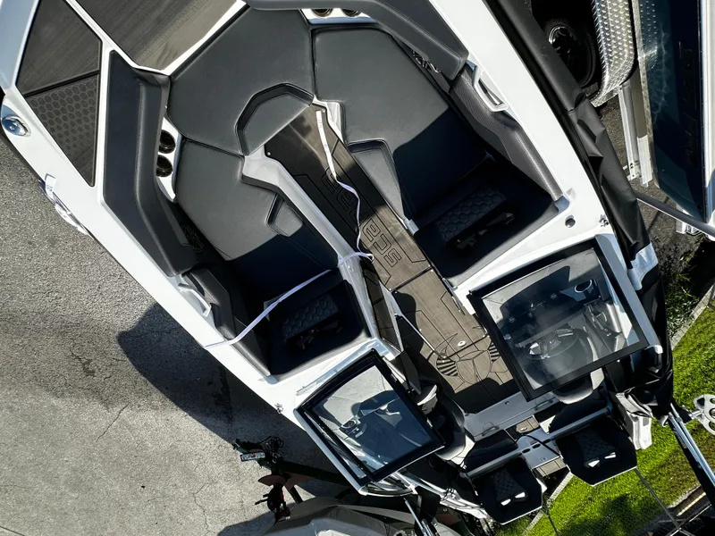 Slide: The Image of 2024 Scarab 235 Wake ID boat interior with sleek seating and modern design. - 13