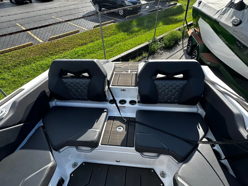 Slide: The Image of 2024 Scarab 235 Wake ID boat interior with sleek seating and modern design. - 28
