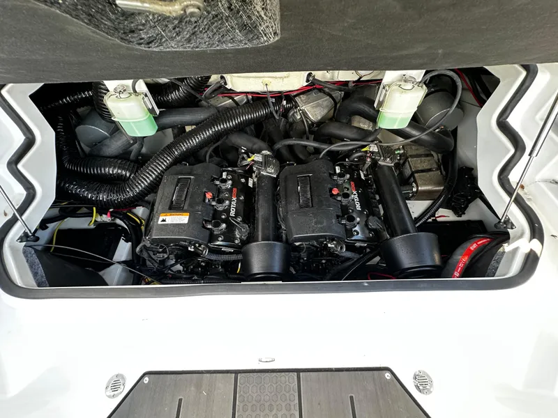 Slide: The Image of 2024 Scarab 235 Wake ID engine compartment showcasing dual engines and components. - 31