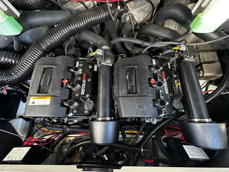 Slide: The Image of Engine compartment of 2024 Scarab 235 Wake ID with Rotax motors. - 32