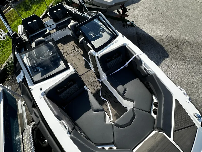Slide: The Image of 2024 Scarab 235 Wake ID boat interior with sleek seating and modern design. - 37