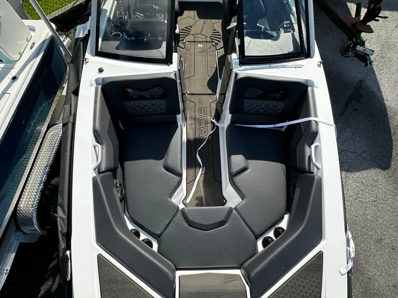 Slide: The Image of 2024 Scarab 235 Wake ID boat interior with sleek seating and modern design. - 38