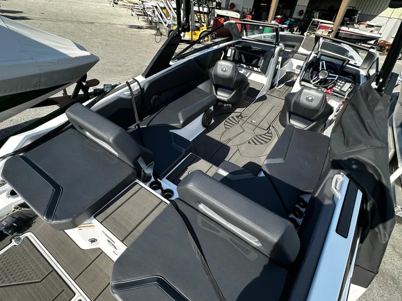Slide: The Image of 2024 Scarab 235 Wake ID boat interior with sleek seating and modern design. - 7