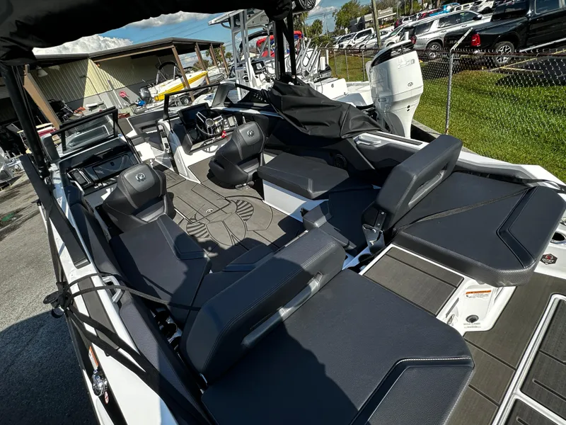Slide: The Image of 2024 Scarab 235 Wake ID boat interior with sleek seating and modern design. - 8