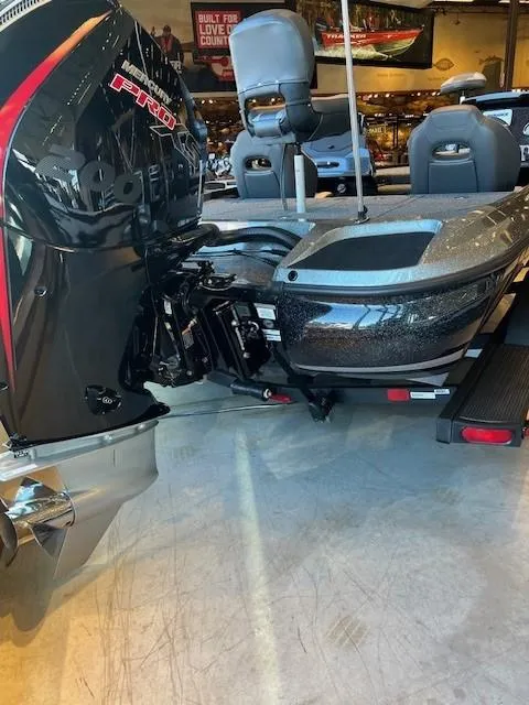 Slide: The Image of 2025 Nitro Z19 boat on pavement, featuring a spacious deck and modern design. - 3