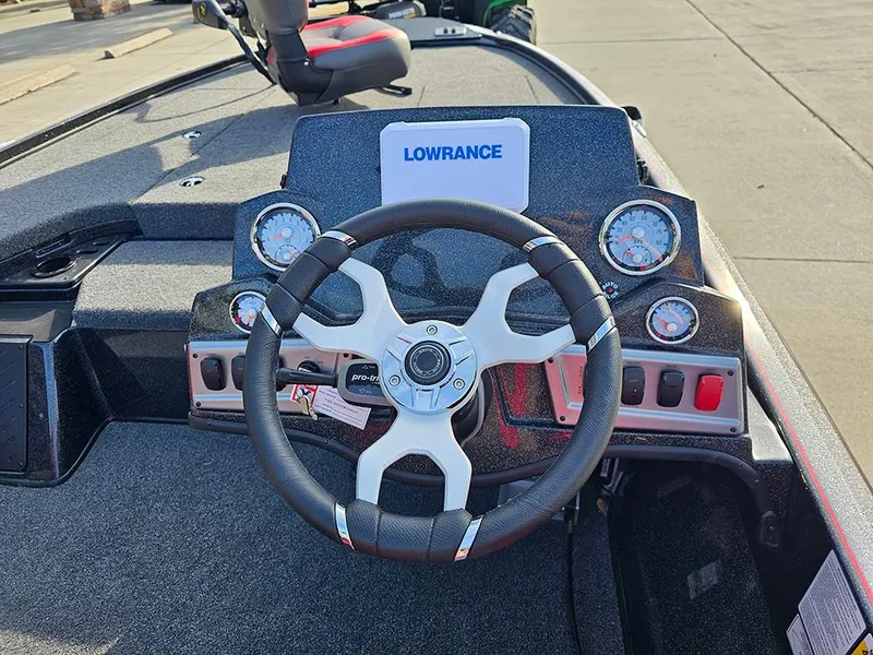 Slide: The Image of Steering console of a 2025 Nitro Z18 boat with Lowrance electronics. - 12