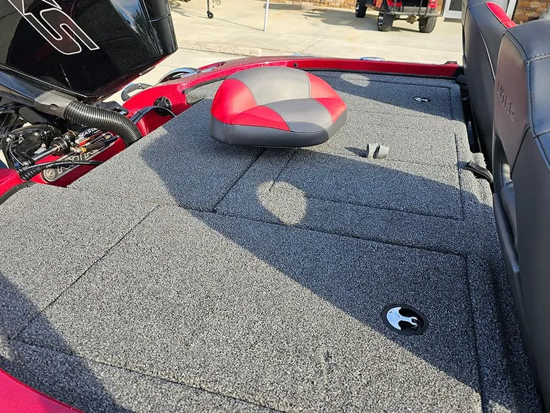 Slide: The Image of 2025 Nitro Z18 boat deck with red and gray seating, featuring storage compartments. - 16