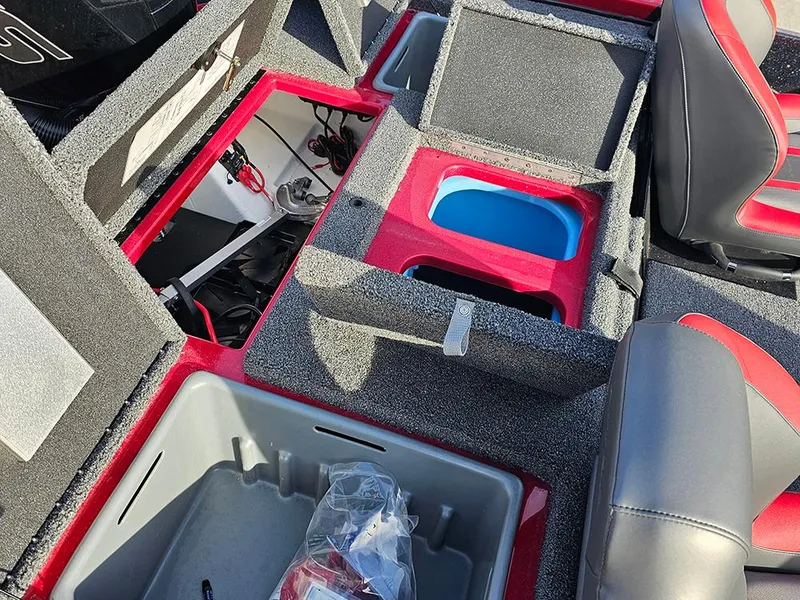 Slide: The Image of 2025 Nitro Z18 boat interior with storage compartments and seating. - 18