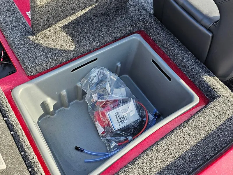 Slide: The Image of Storage compartment in a 2025 Nitro Z18 boat with accessories inside. - 20