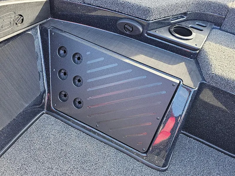 Slide: The Image of 2025 Nitro Z18 boat interior with storage compartment and cup holder. - 21