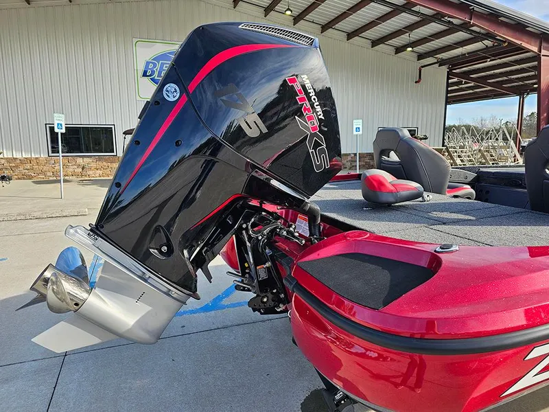 Slide: The Image of 2025 Nitro Z18 boat with powerful outboard motor, parked outdoors. - 9