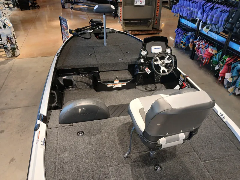 Slide: The Image of 2025 Nitro Z17 fishing boat interior with steering console and seating. - 3