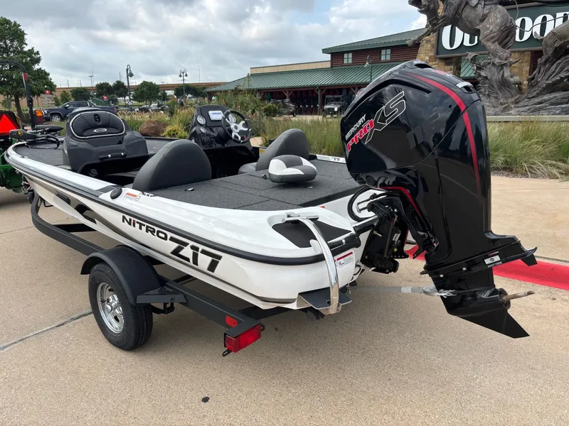 Slide: The Image of Nitro Z17 2025 fishing boat with trolling motor and swivel seat on deck. - 2